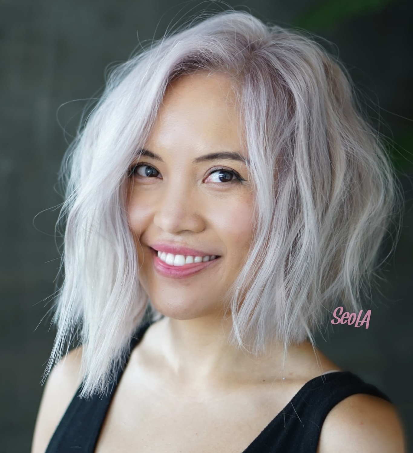 Asymmetrical Bob Cut on Thin Blond Hair