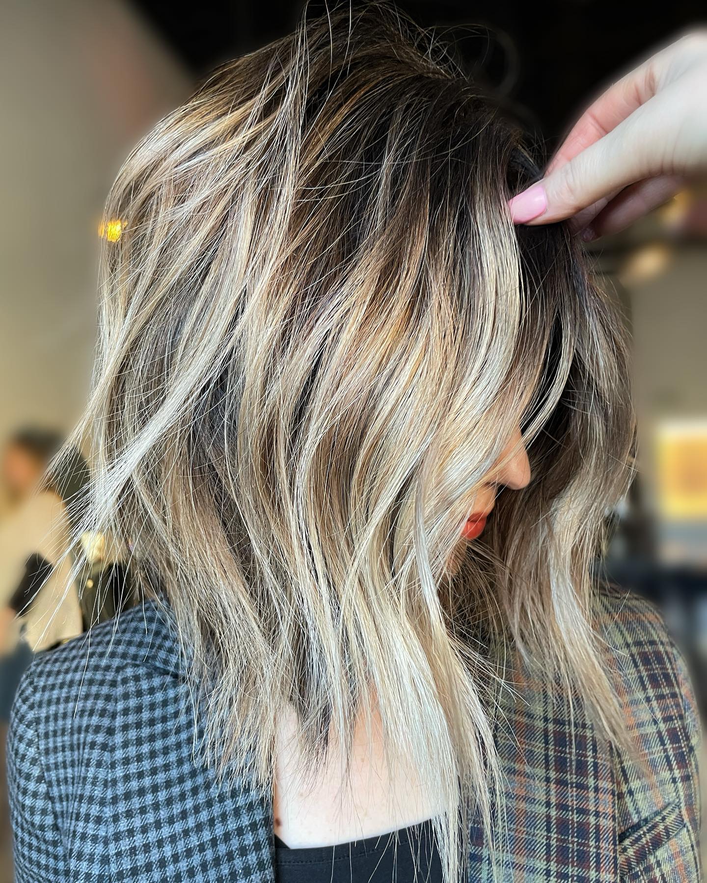 Beige Blonde Color on Wavy Bob Cut