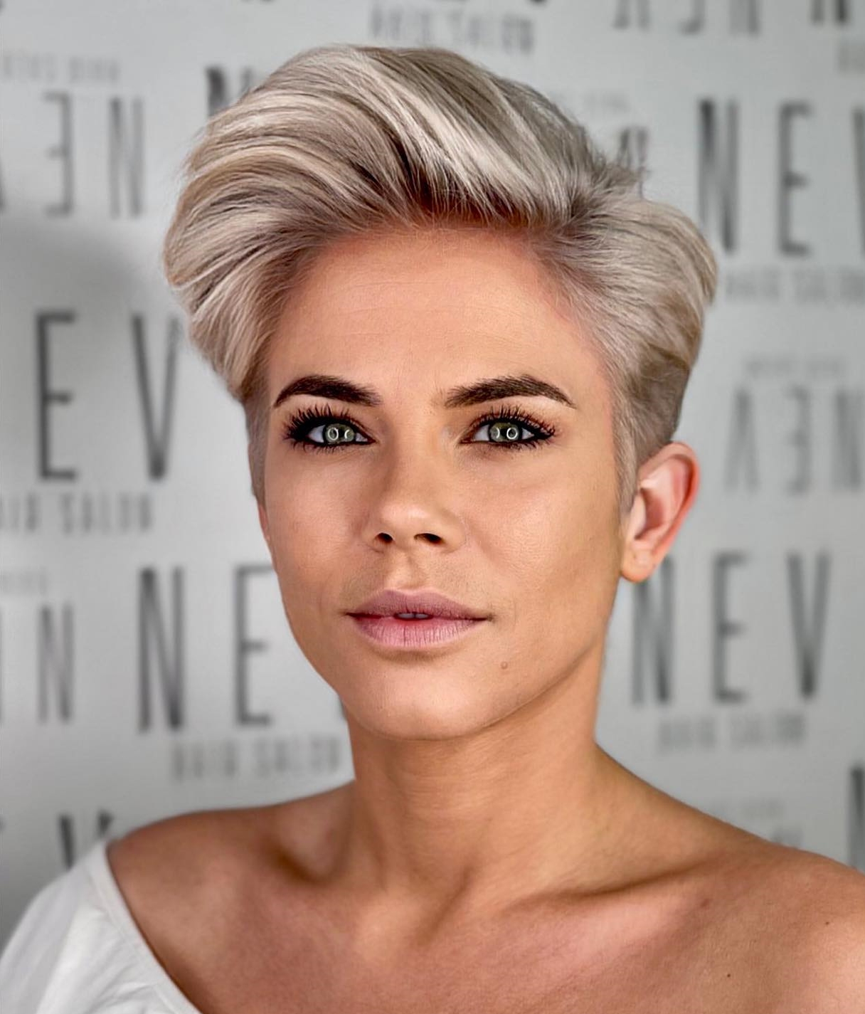 Blonde Pixie Cut with Side Swept Top