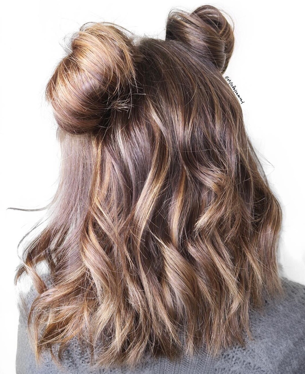 Half Up Half Down Hairstyle With Two Buns