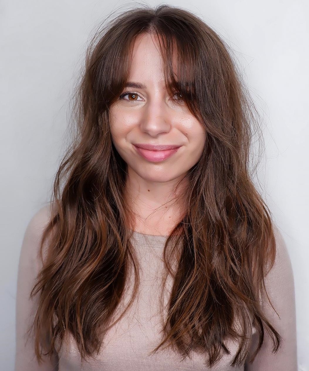 Layered Brown Hair With Curtain Bangs