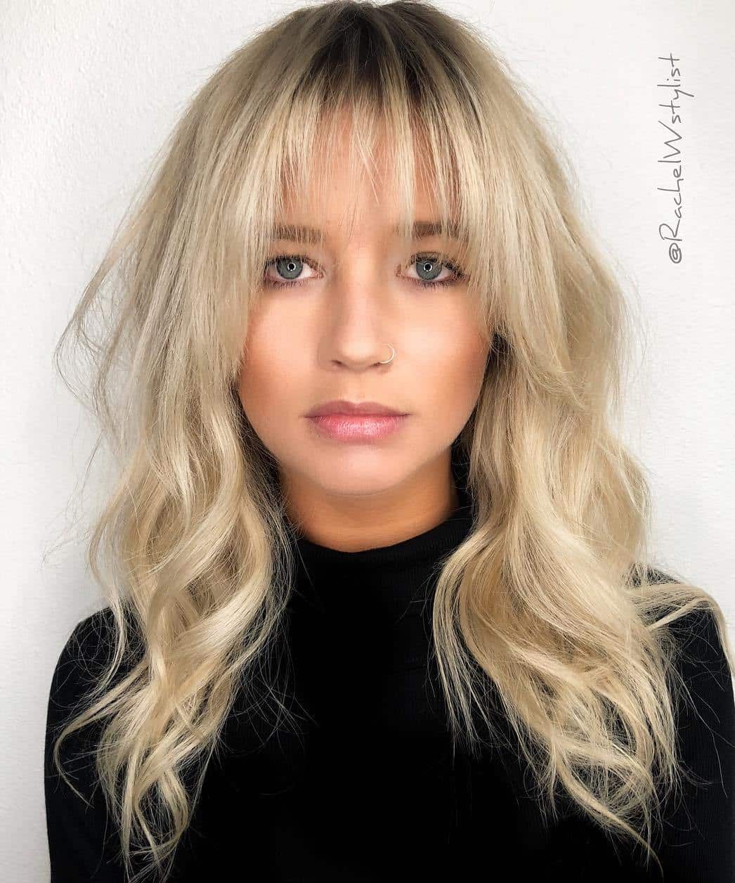 Long Blonde Shag With Wispy Bangs