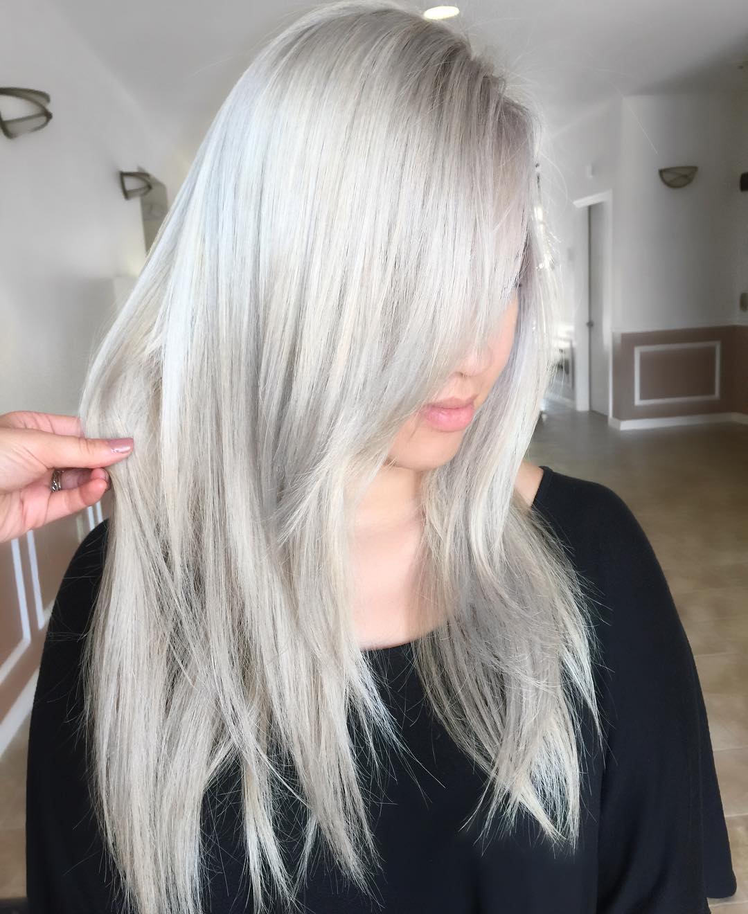Long Sliced Silver Blonde Hairstyle