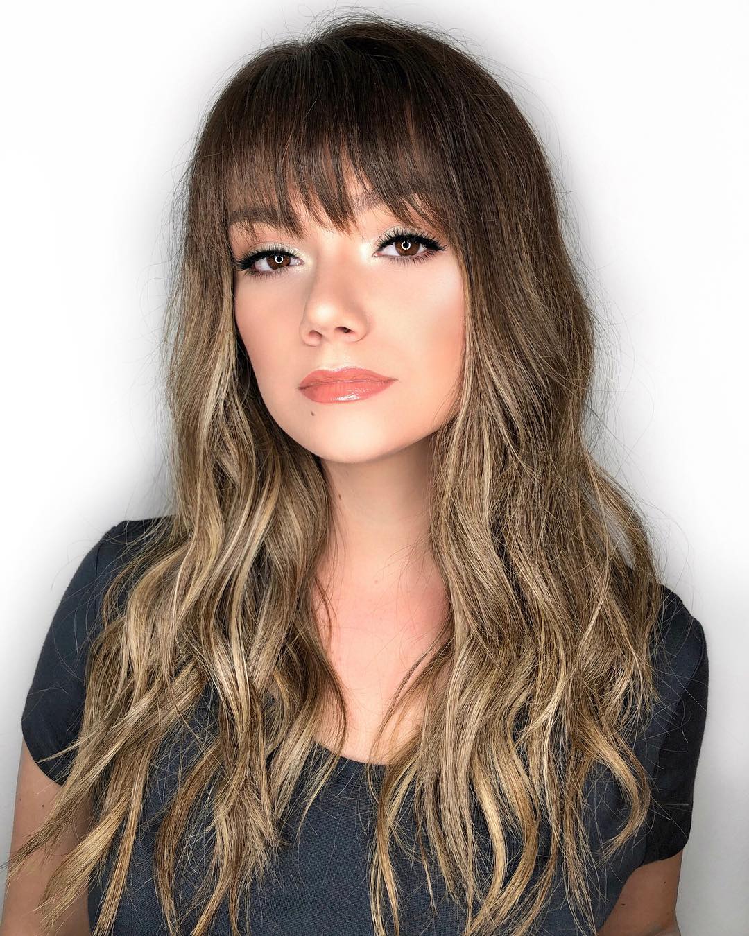 Long Wavy Hairstyle With A Piece-Y Fringe