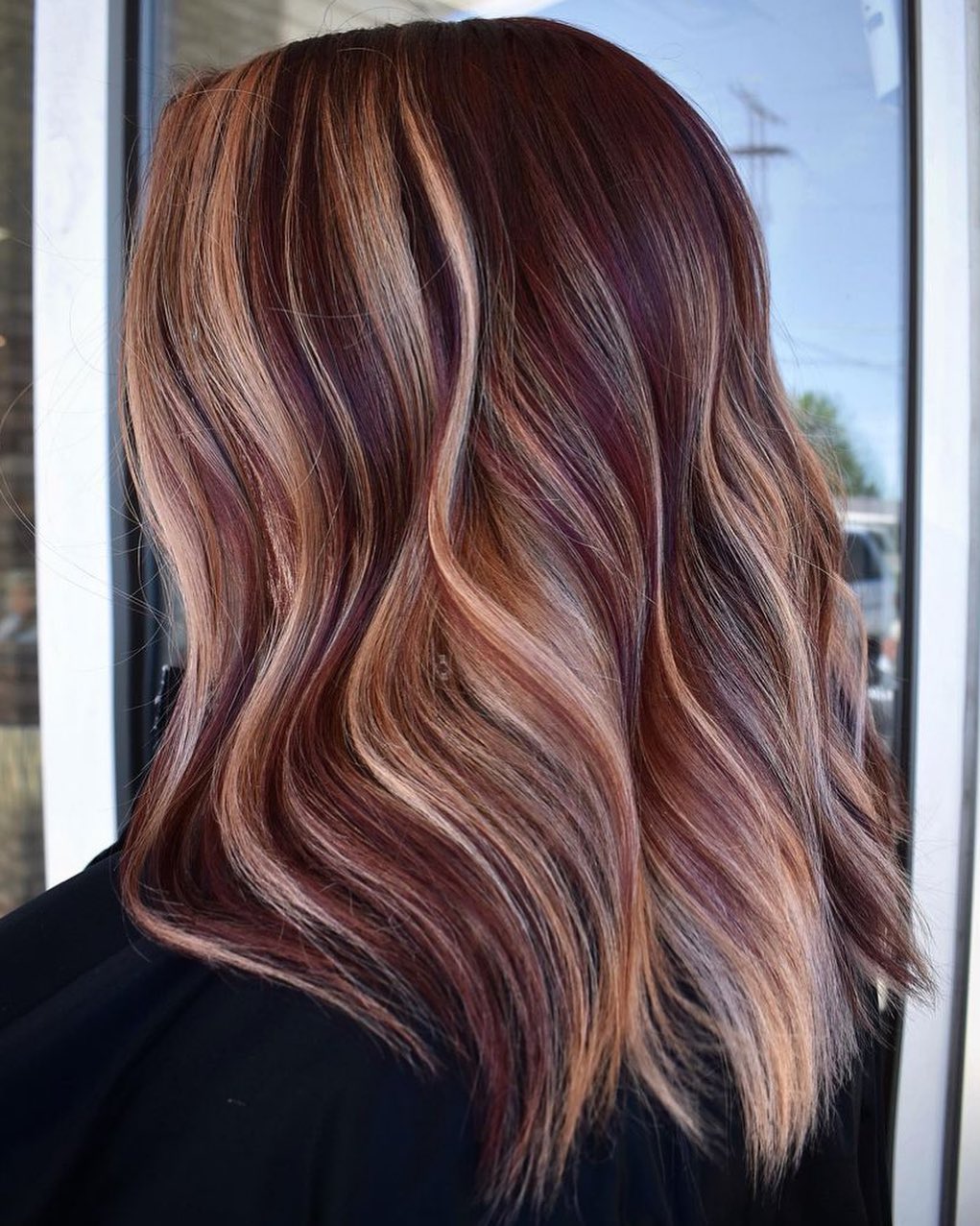 Medium-length Blonde Hair with Red Highlights