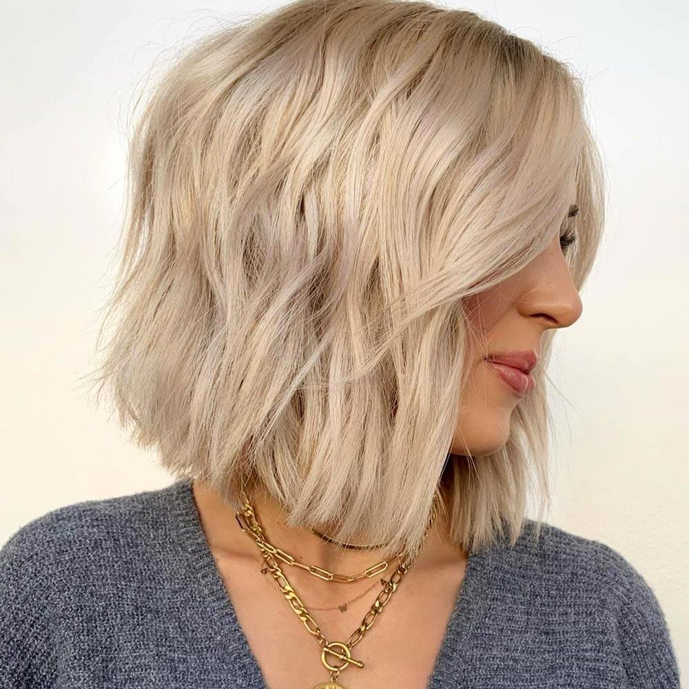 Messy Bob With A Deep Side Part