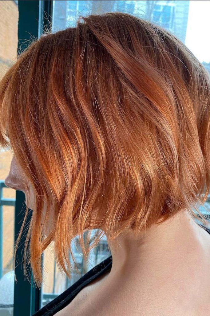 Orange Stacked Bob With Bangs