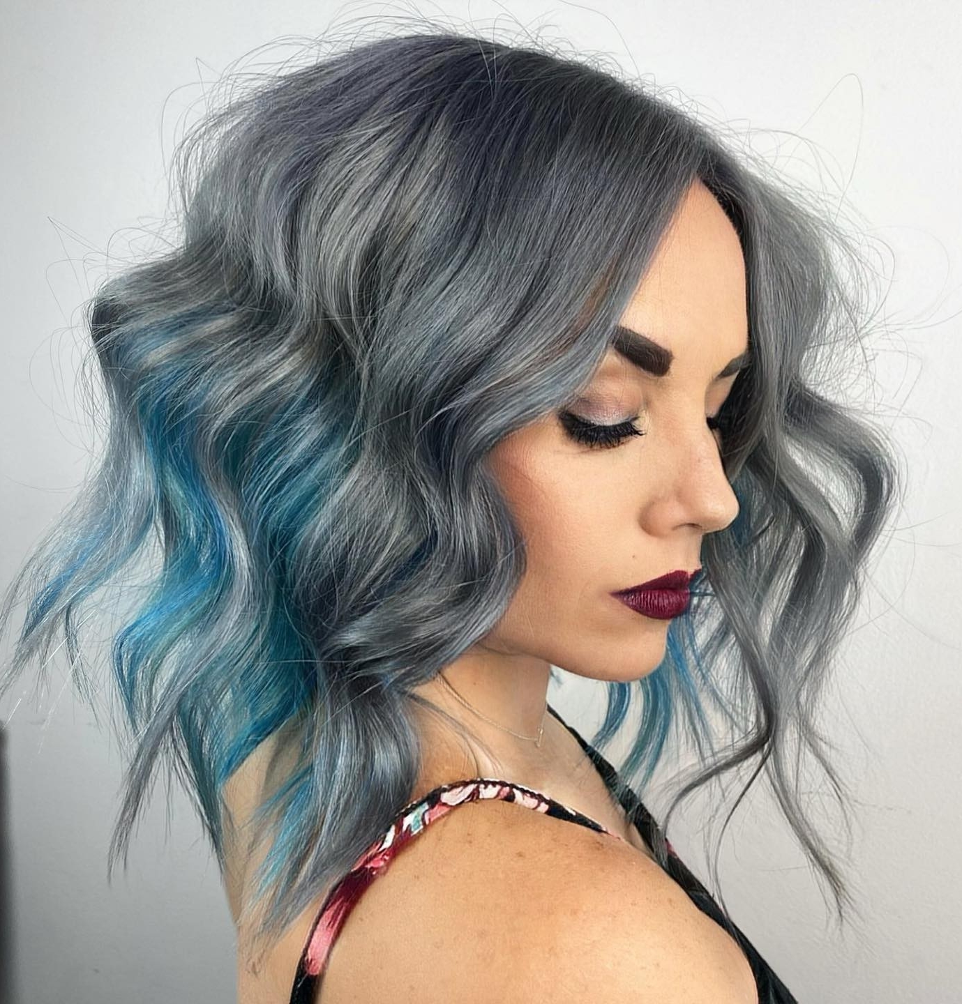 Short Wavy Hair with Gray and Blue Ombre Hues
