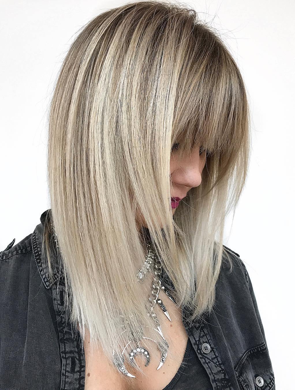 Straight Layered Hairstyle With Bangs