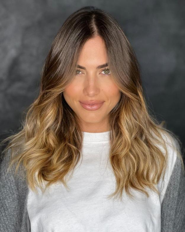 Straight Layered Hairstyle with Ombre Highlights
