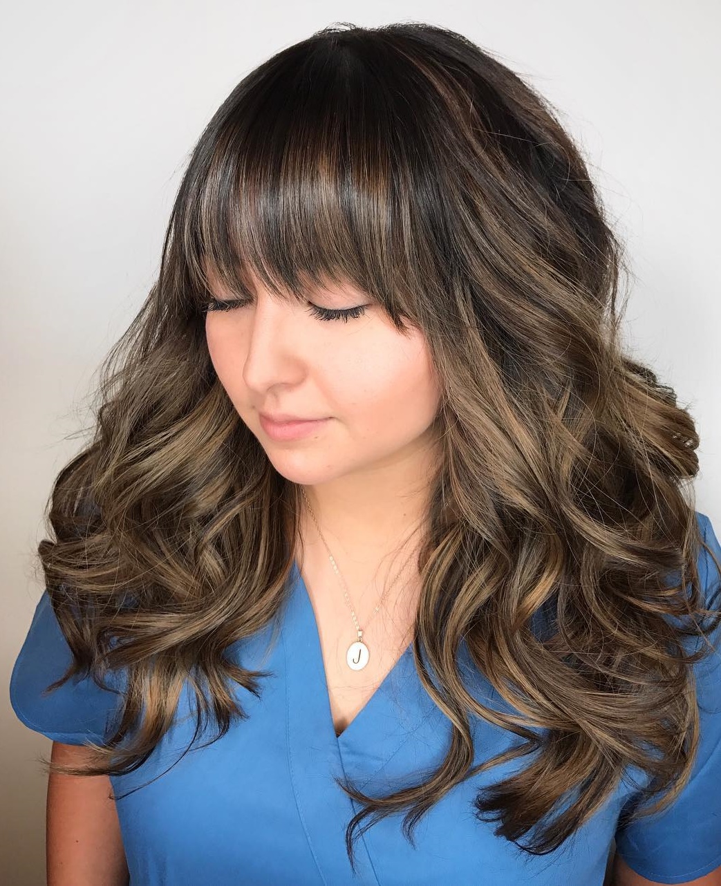 Wavy Hairstyle With A Fringe For Long Hair