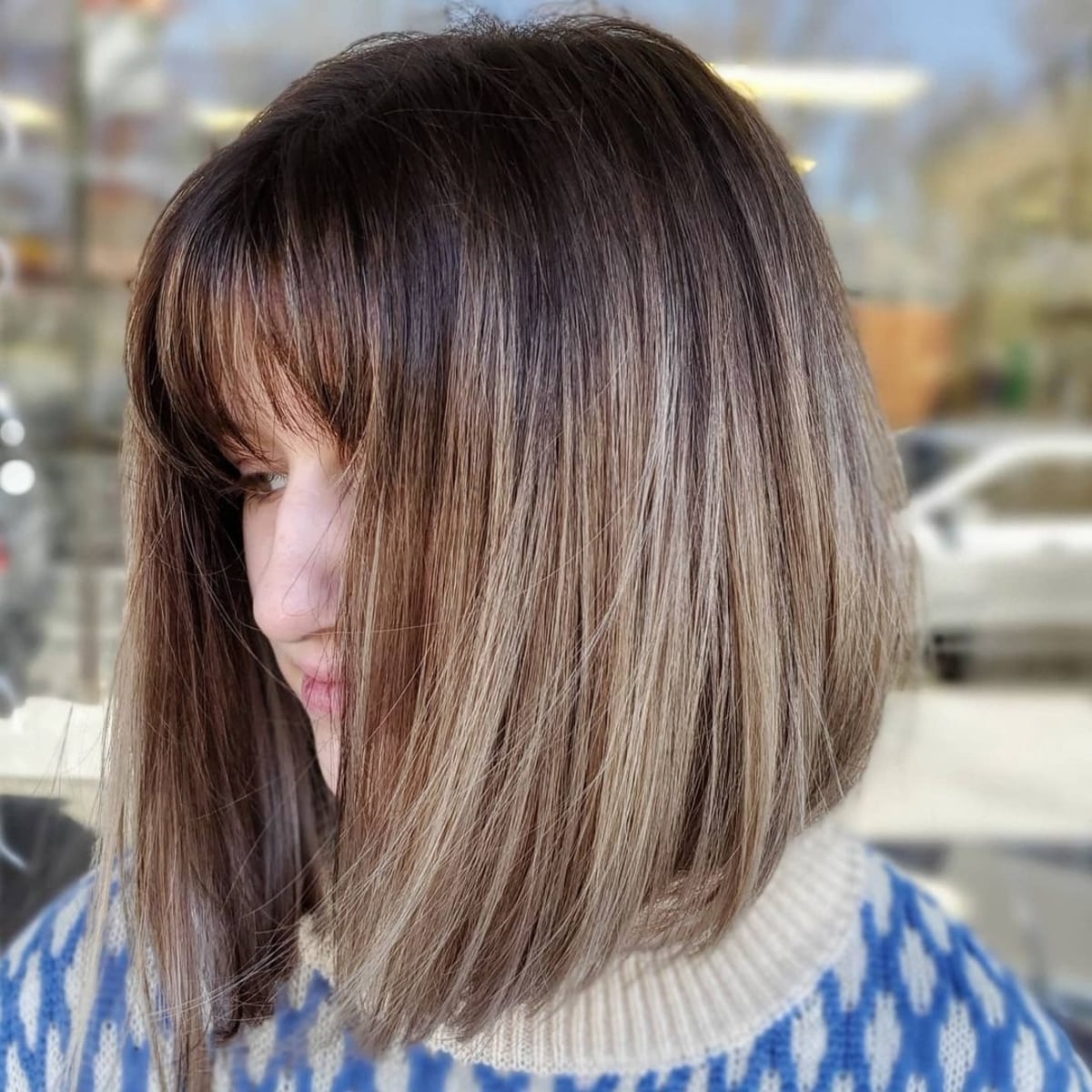 A thick short bob with bangs