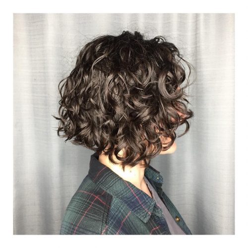 A very layered short bob for naturally curly hair for women
