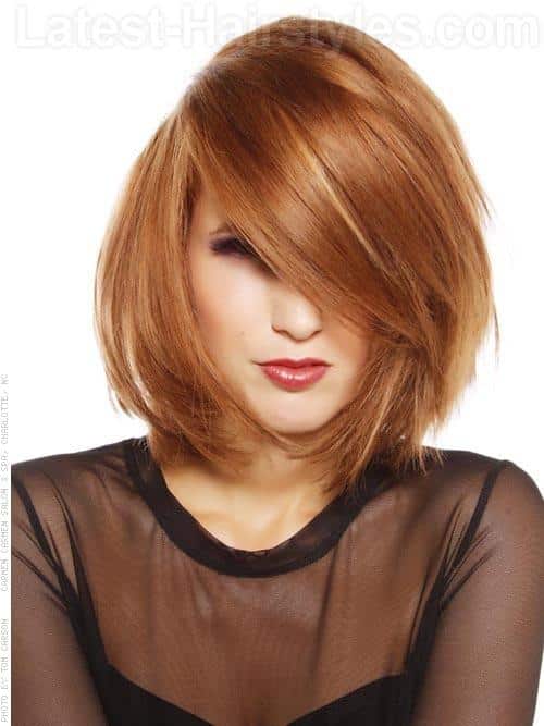 An oval face shape with medium bob haircut