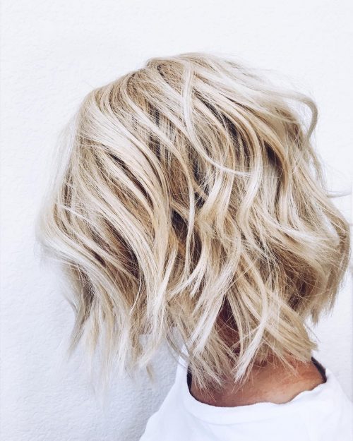 Beachy Champagne Blonde Wavy Bob with Shorter Layers