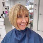 blonde-asymmetric-bob-with-wispy-bangs