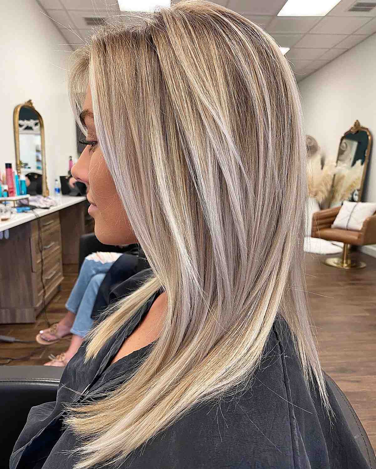 blonde layered medium-length hairstyle