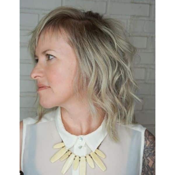 Blonde Medium Haircuts For Wavy Hair with Fringey Bangs