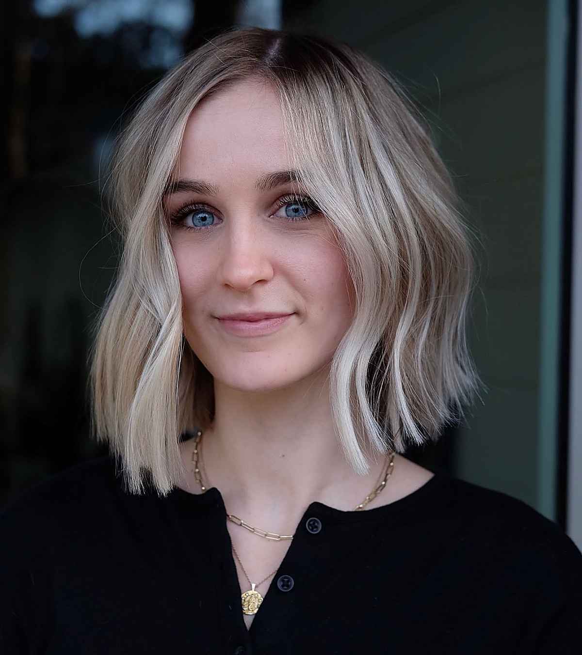 blonde neck-length wavy bob