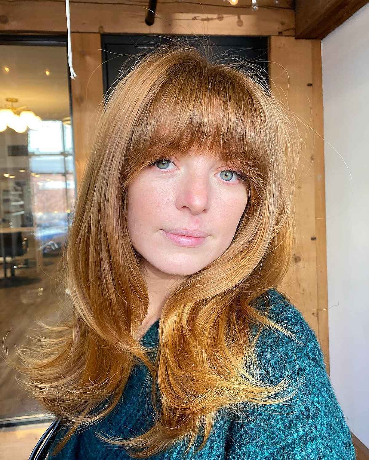 Blowout Style for Layered Hair with Bangs