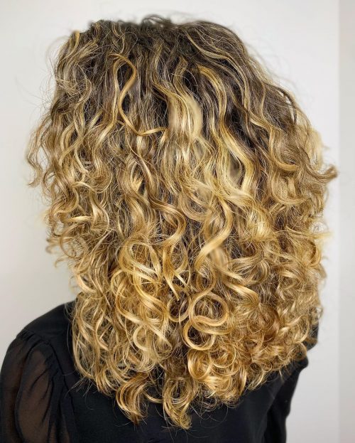 blunt cut long hair with layered curls