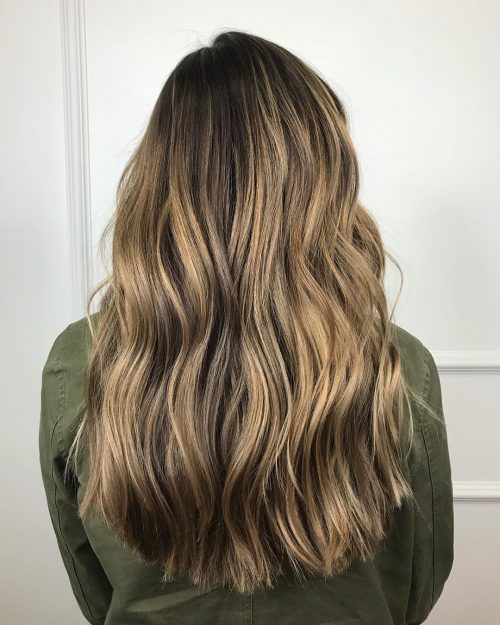 blunt cut long hair with mid-point layers