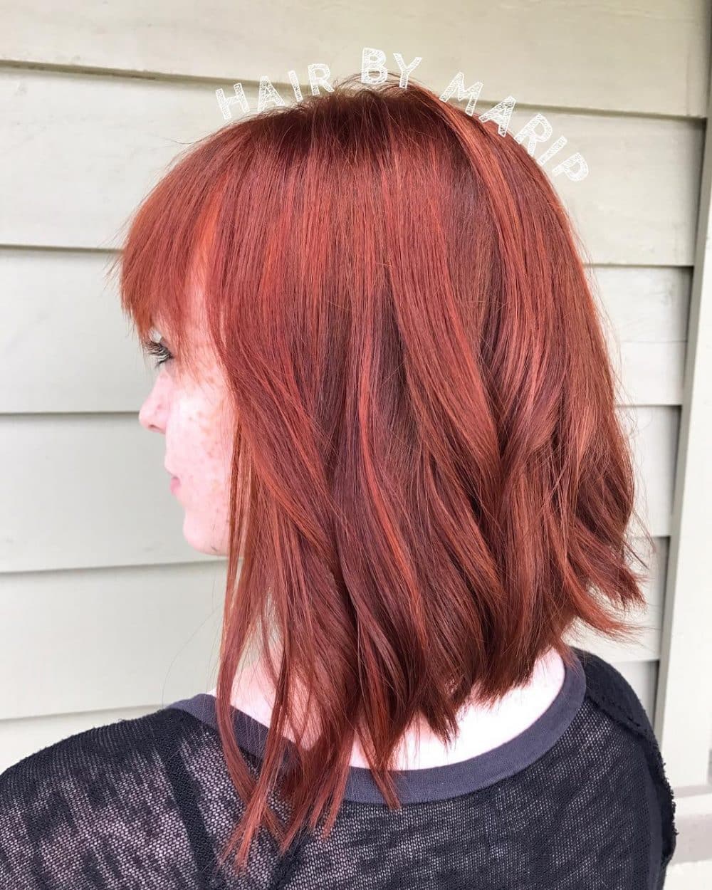 Bold Medium Angled Bob with Bangs for Fine Hair