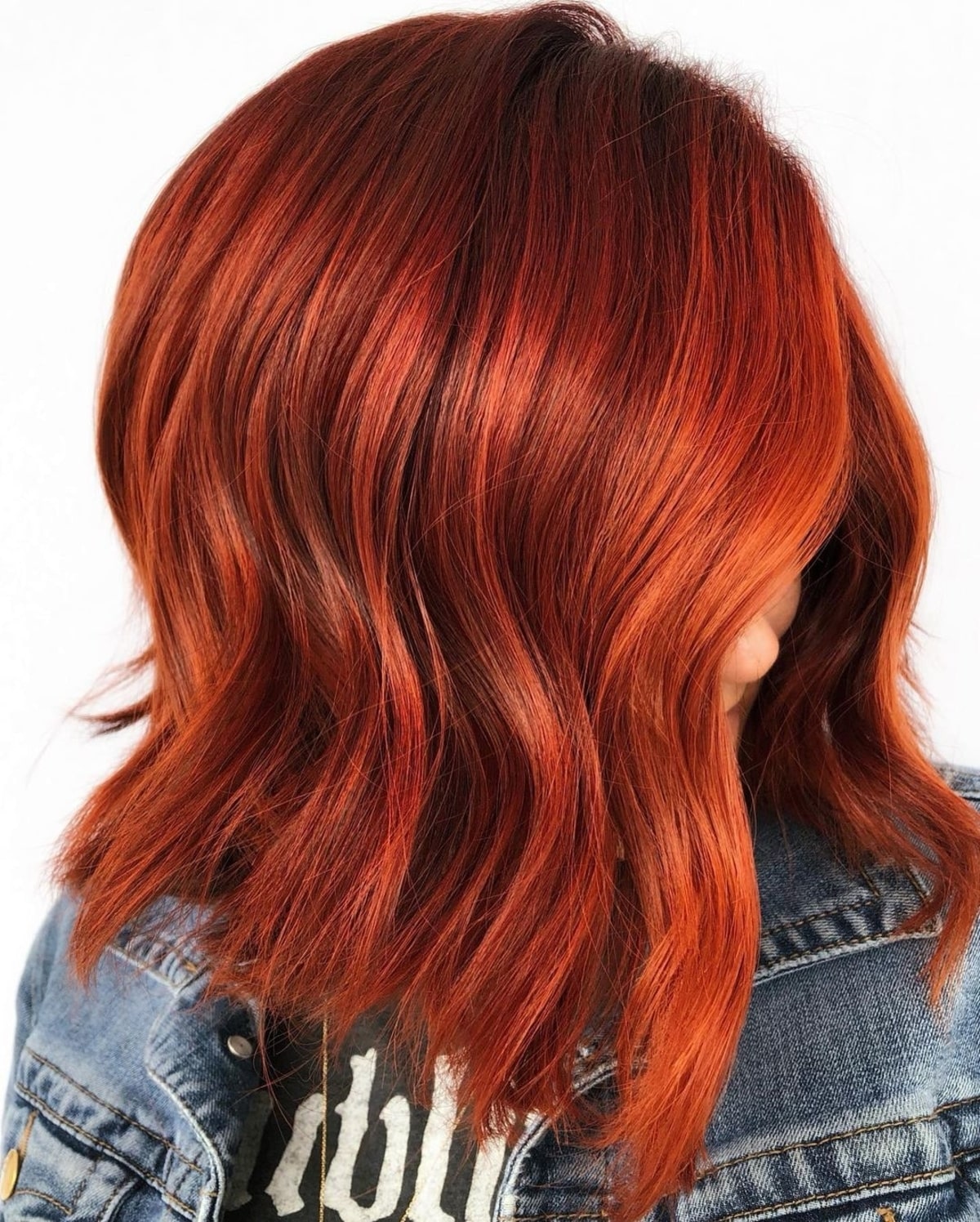 Bright strawberry red hair