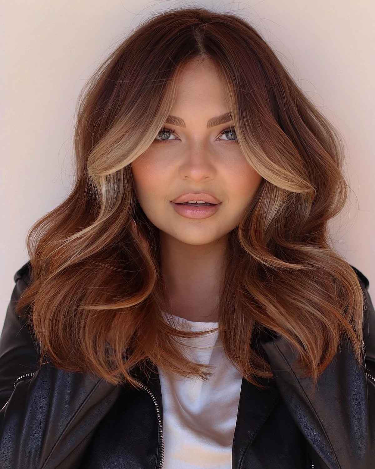 brown balayage with face-framing layers