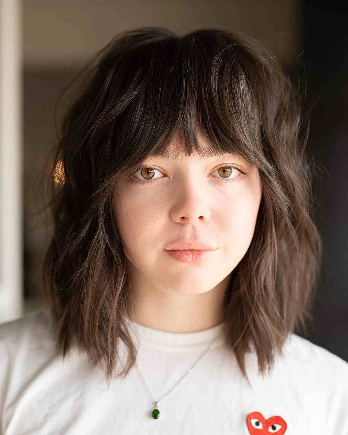 Brunette Shoulder-Length Wolf Cut with Choppy Fringe