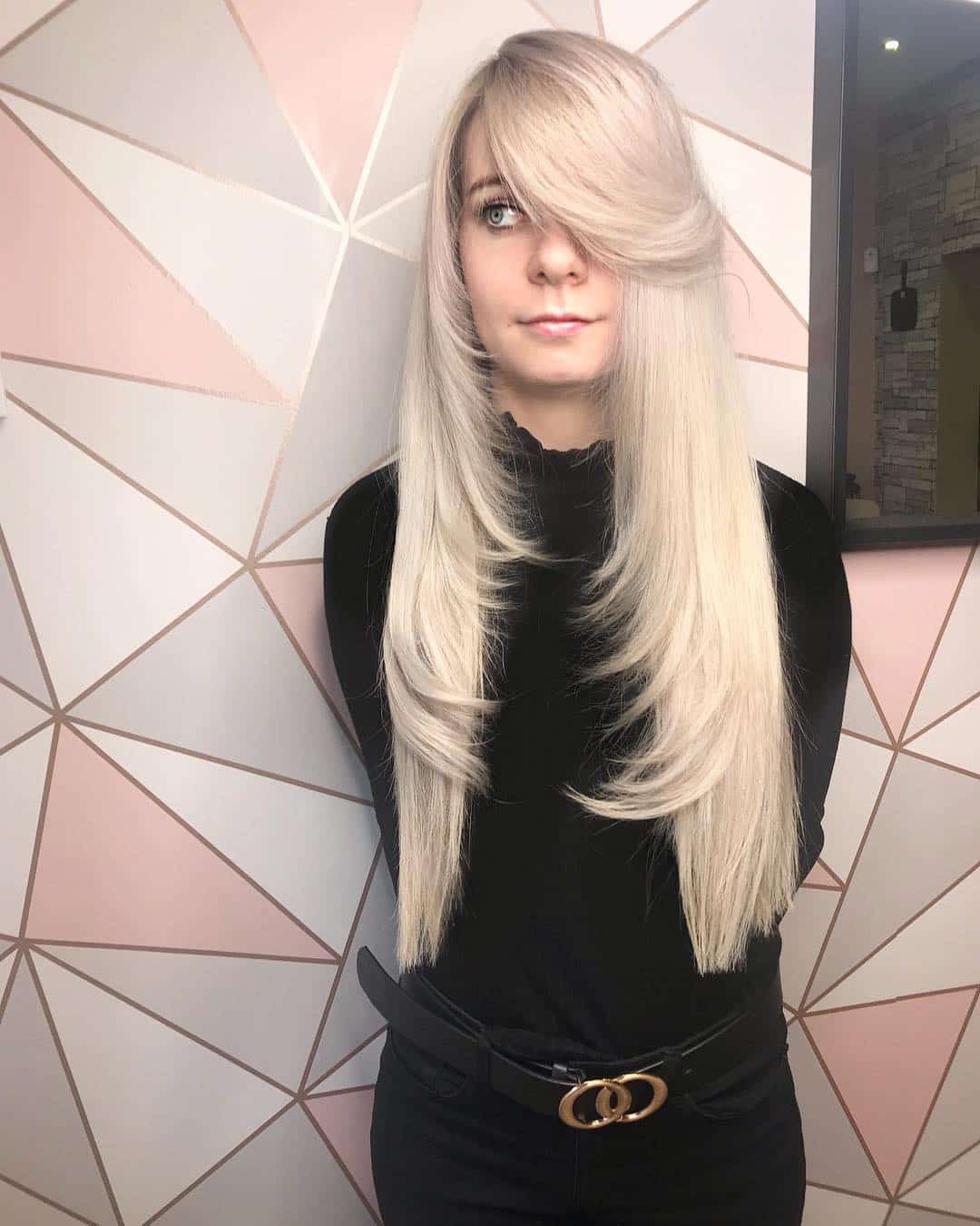 Chic Side-Swept Bangs on Long Blonde Hair