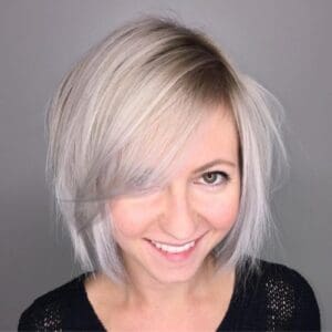 Chin Length textured bob cut With Side Swept Bangs