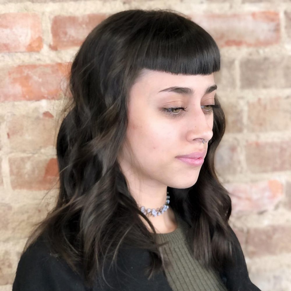 Classic bettie bangs with shaggy layers