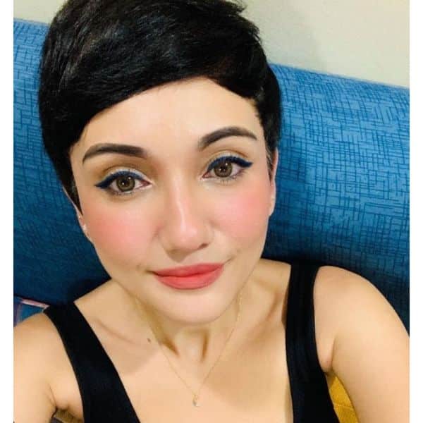 Comb-over Dark Pixie With Swept-Over Bangs