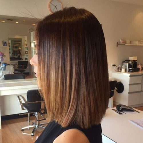 Cool shoulder-length haircut with dark brown hair