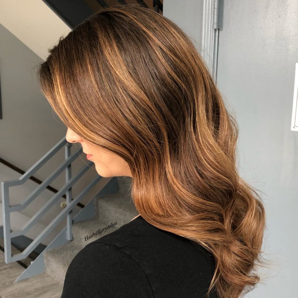 Copper and Strawberry Blonde Balayage Highlighting on a Dark Root