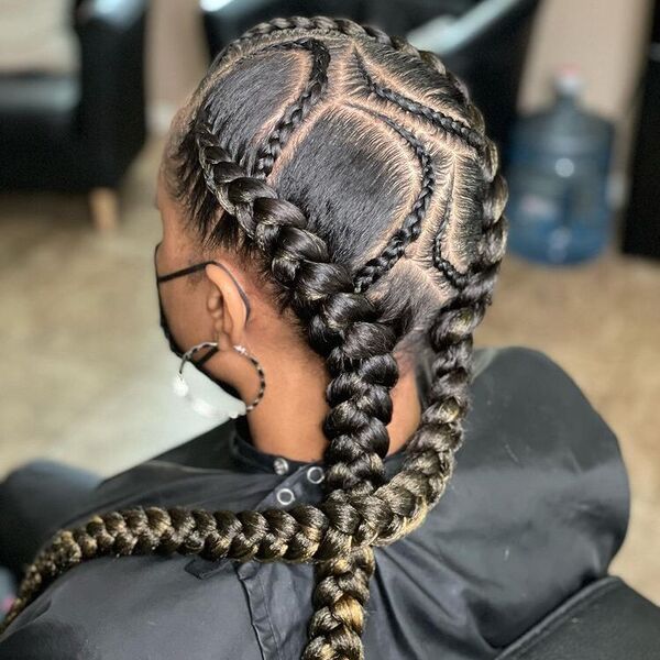 Cornrow Hairstyles - a woman wearing a black salon's cape