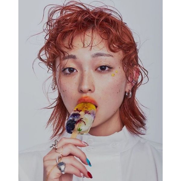 Curly Pink Mullet With Messy Bangs