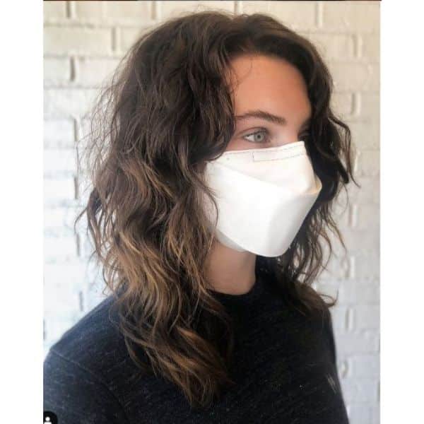 Curly Shag Medium Haircut with Side-swept Fringe and Soft Curls