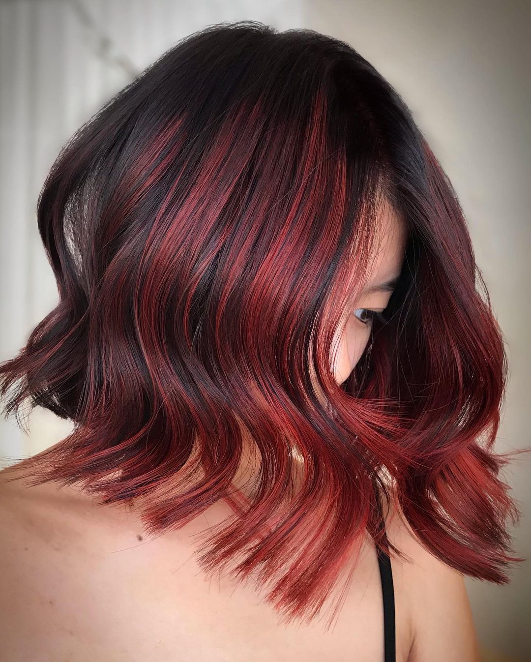 Dark Hair with Bright Red Highlights