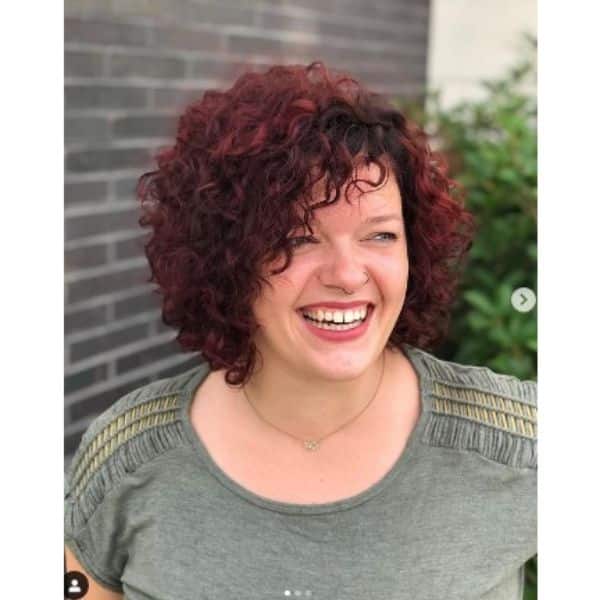 Dark Red Asymmetric Curly Bob
