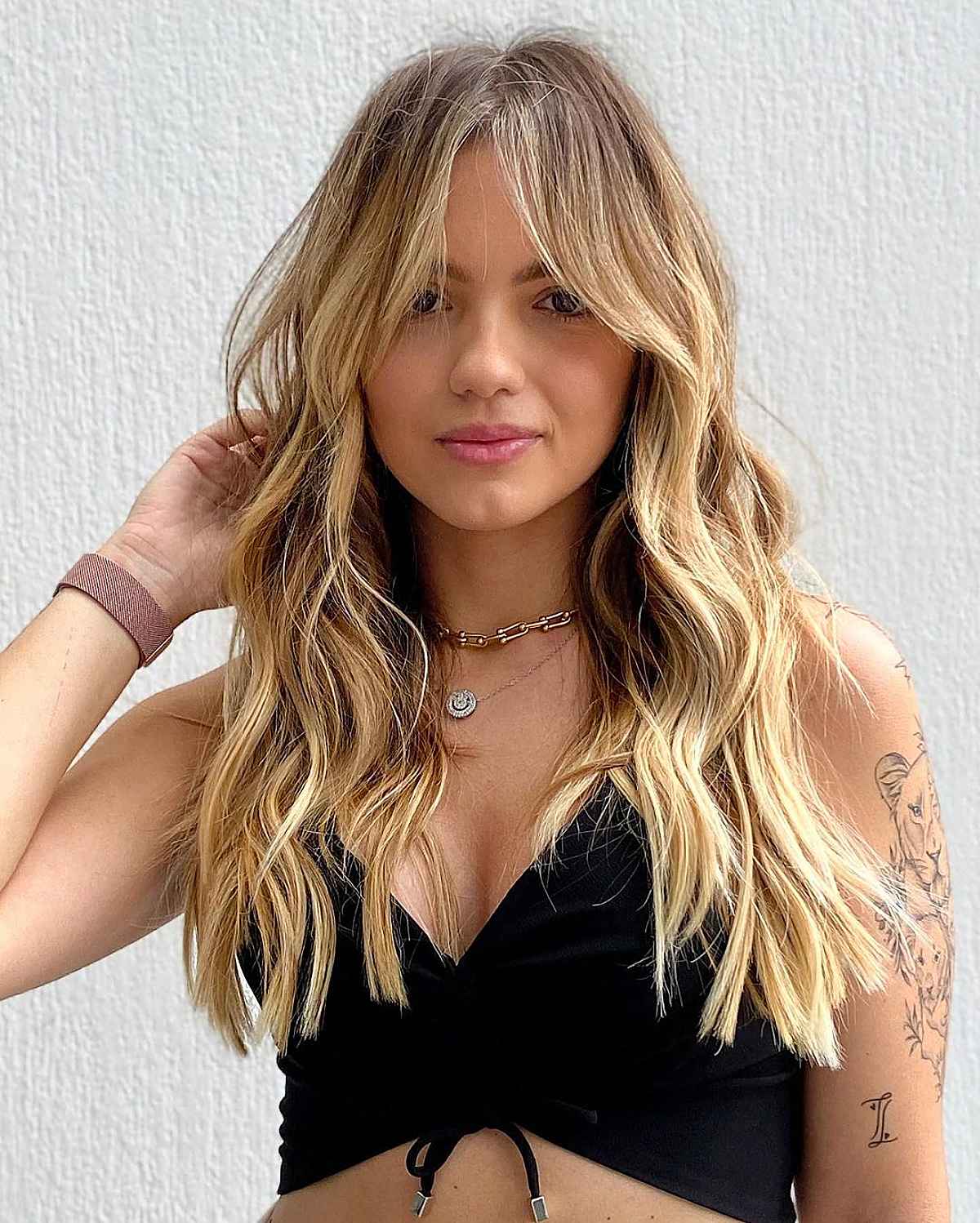 Face-Framing Bardot Bangs with Beach Waves