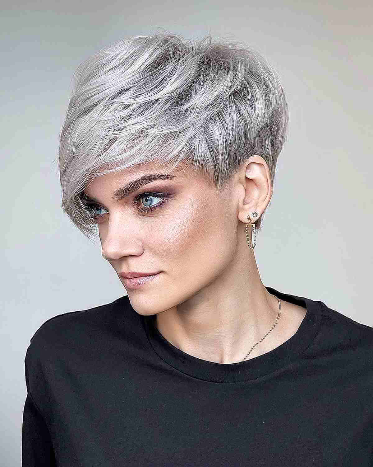 Feathered & Messy Blonde Pixie Cut with Wispy Bangs
