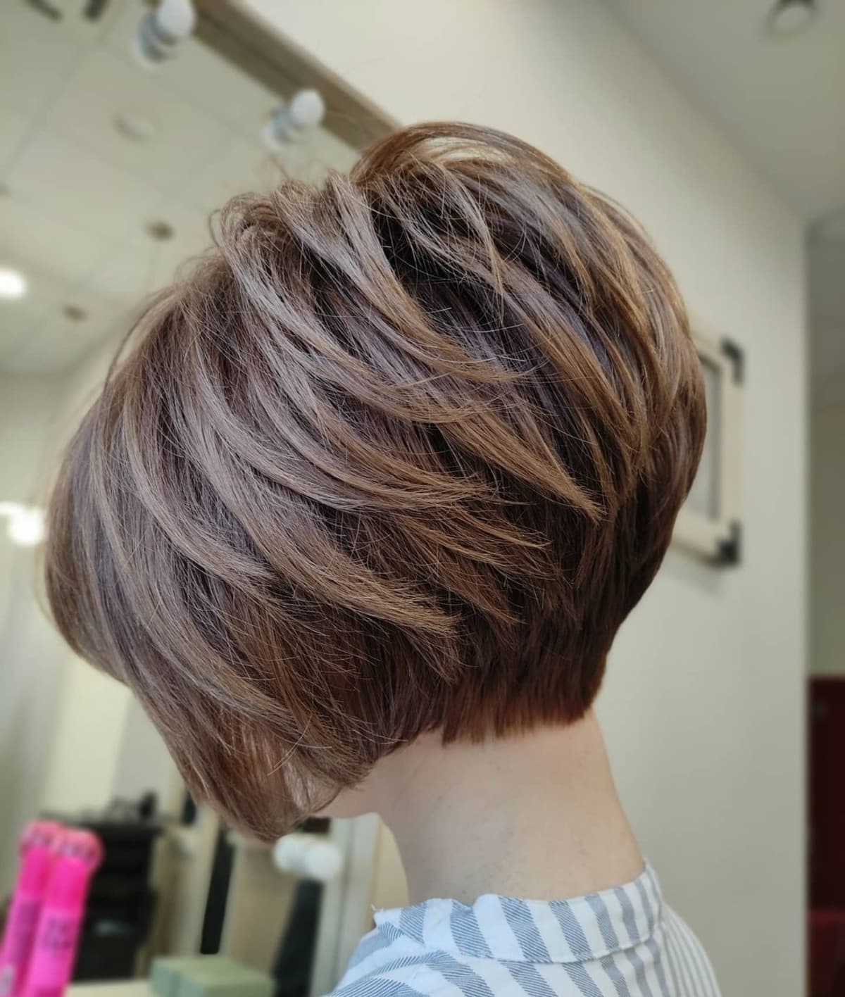 Feathered stacked bob with piece-y layers