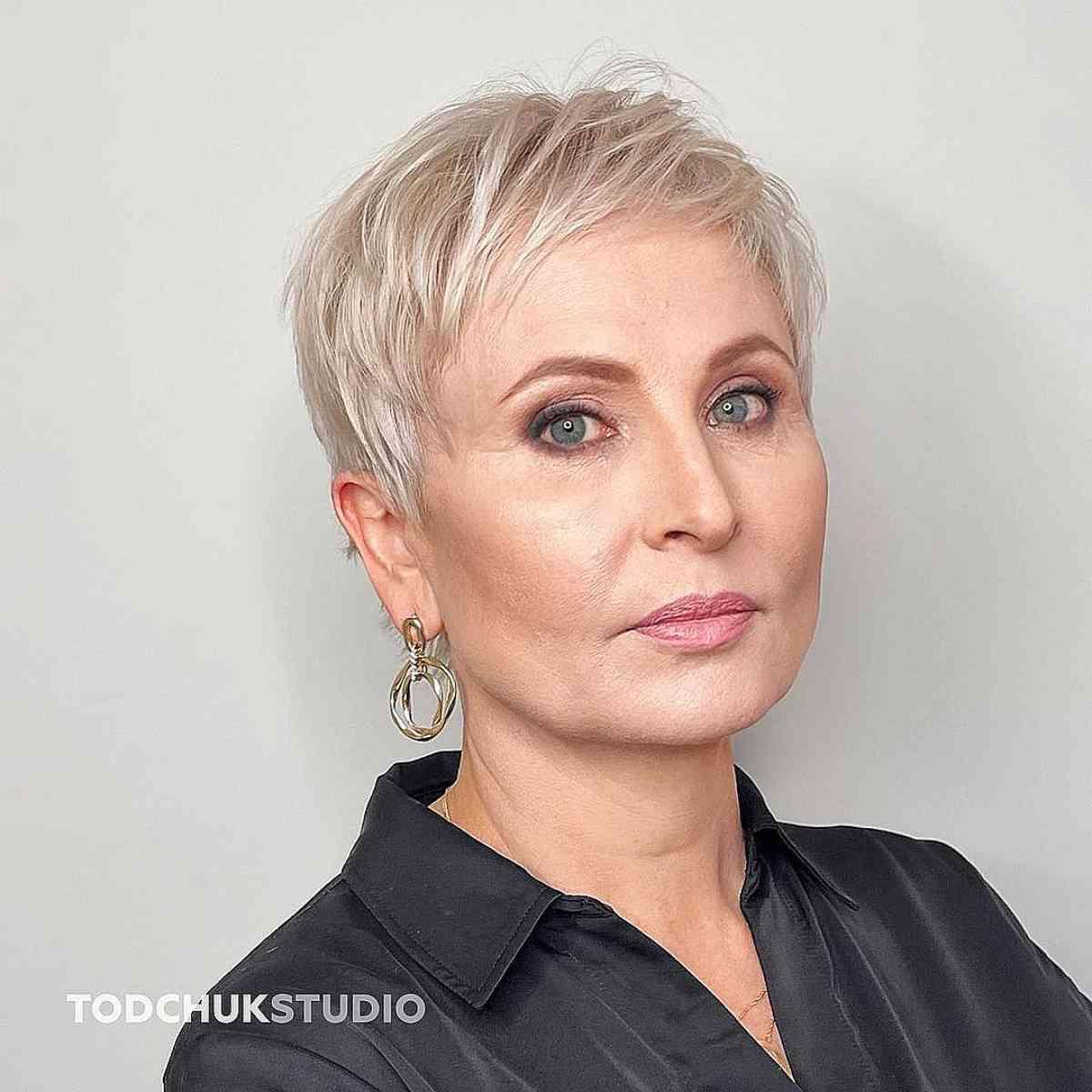 Flattering short haircut for women over 50 with round faces