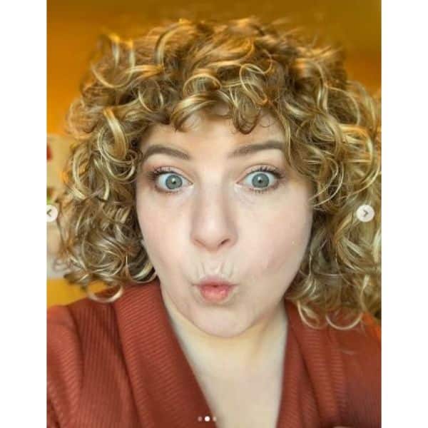 Golden Blonde Curly Bob With Straight Bangs Hair