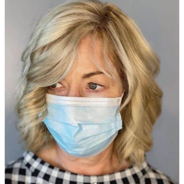 Golden Blonde Curly Bob With Thin Fringe