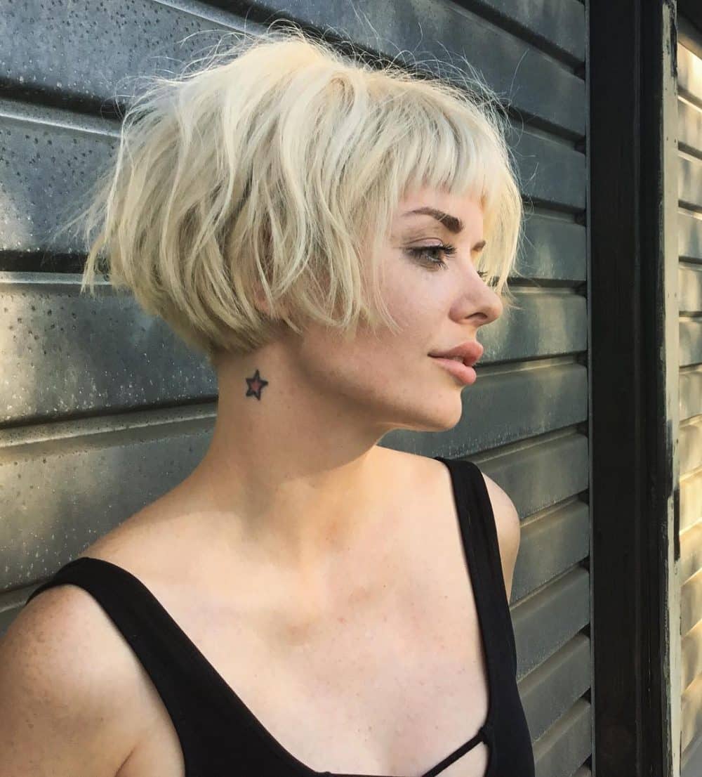 Honey Blonde Ear-Length Bob with Bangs