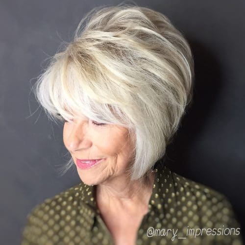 Inspiring short hair with feathered bangs for older women