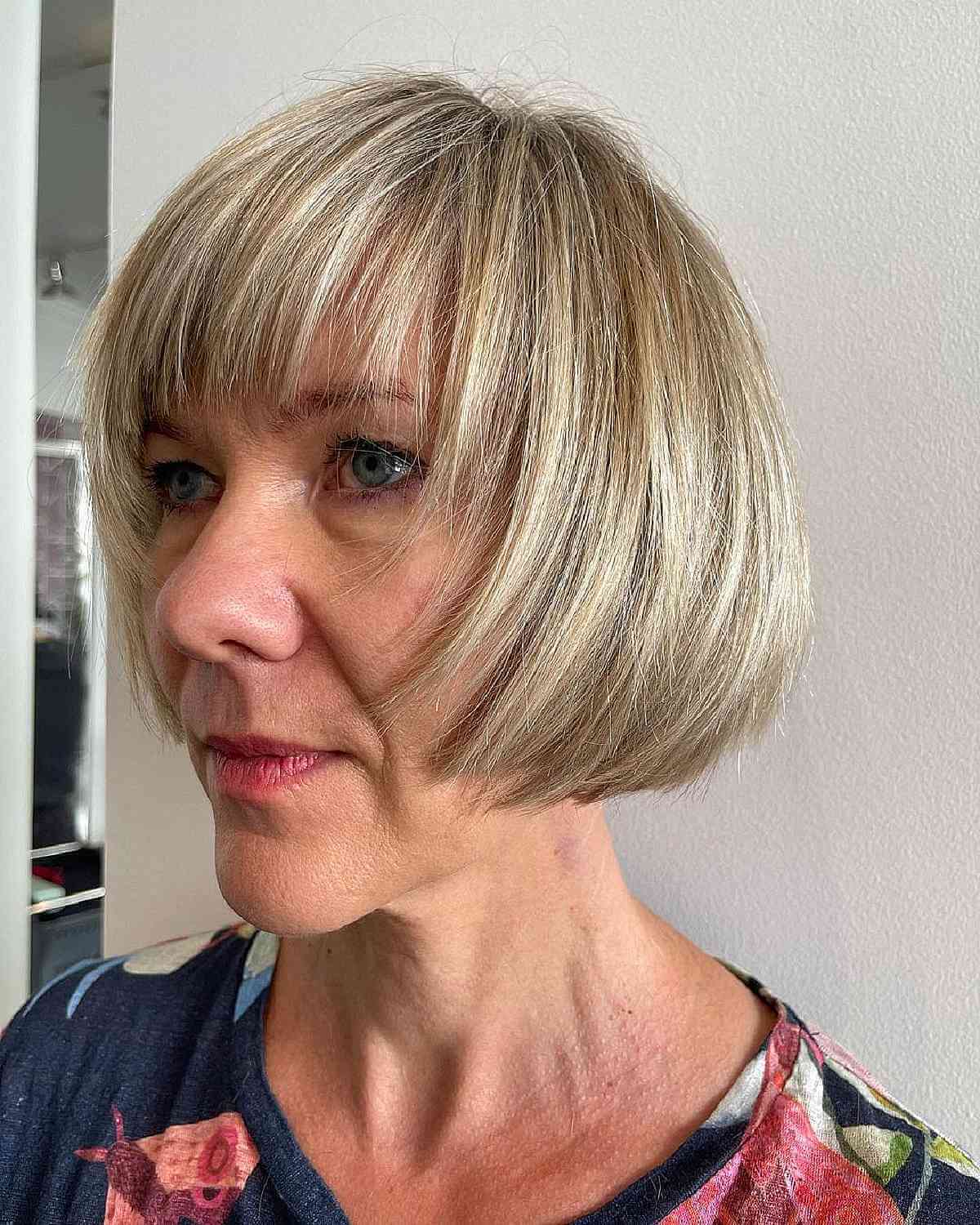 Jaw-Length Textured Bob with Wispy Bangs for Women Over 60